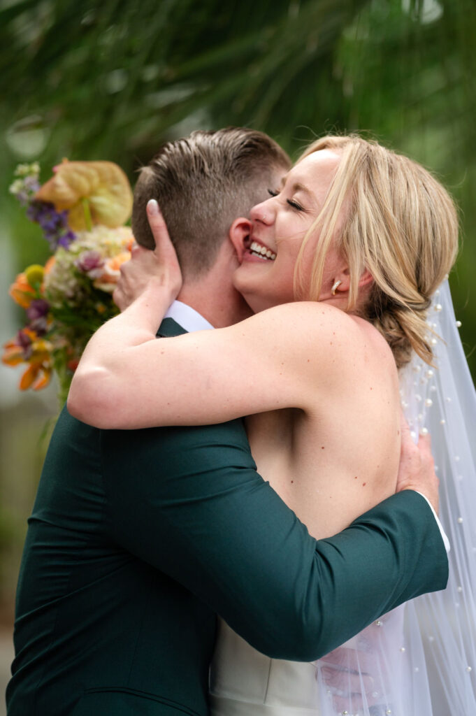 Hanna & Peter hug during wedding
