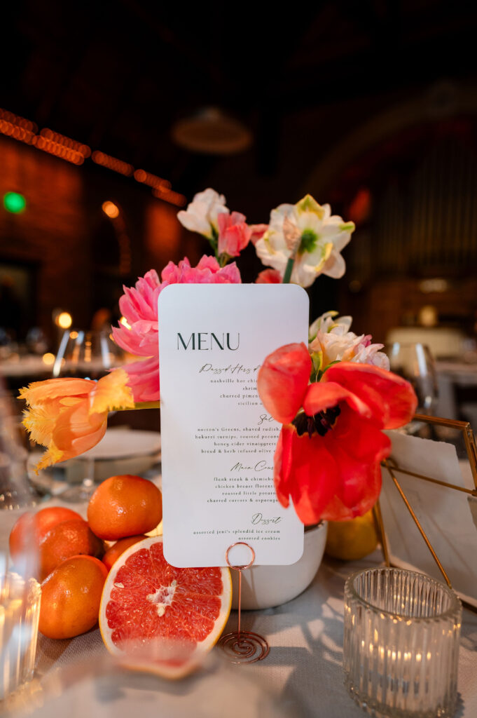 Wedding table with flowers and menu